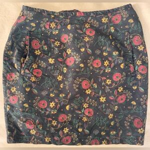 ESPIRIT. Vintage, black denim mini skirt with multiple color floral print.
